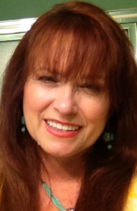 Woman with upper teeth crowned by Dr. Wiedower