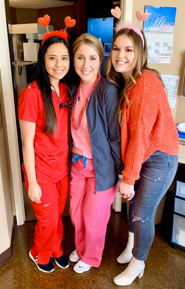 Three staff members on Valentine's day