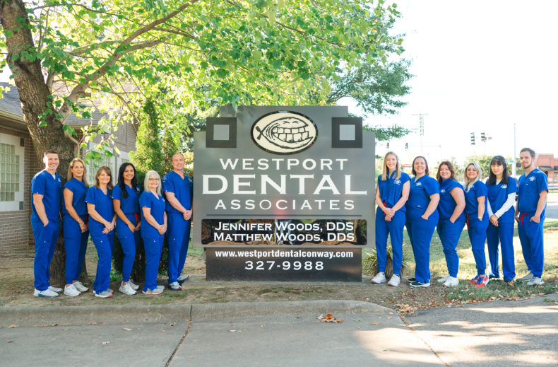 Staff taking photo outside